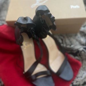 Christian Louboutin US size 11 black heels.